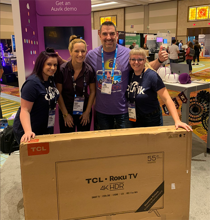 Auvik team members with the winner of the IT Nation Connect 2019 TV draw