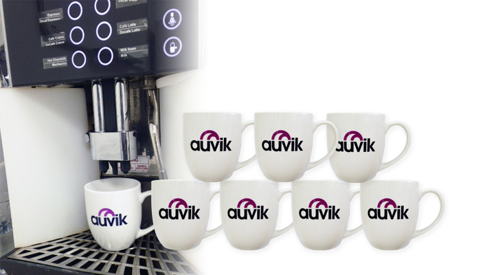 The 12 Days of Networking 8 Auvik mugs espresso machine