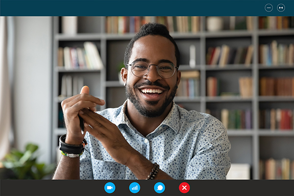 smiling man on a video call