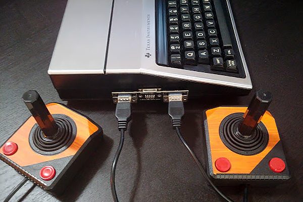 Two replica Atari joysticks by Hyperkin