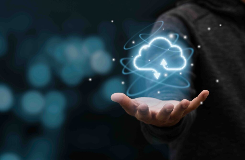 hand holding an image of a cloud, representing cloud software