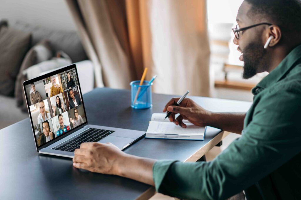 man on zoom call to discuss saas optimization tactics